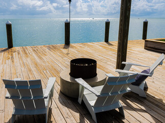Deck Chairs on Wooden Dock  On The Atlantic Ocean, Islamorada, Florida, USA