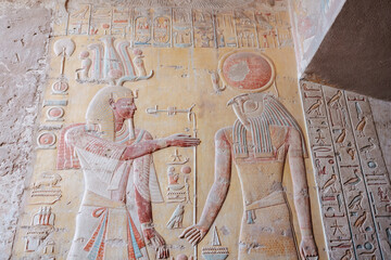 Reliefs and hieroglyphics in a tomb in the valley of Kings, Egypt