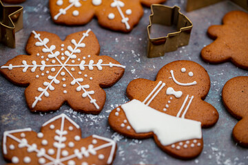 Gingerbread man and other christmas cookies closeup