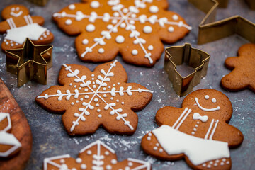 Christmas cookies closeup with star shaped golden molds 
