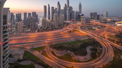 Dubai Marina highway intersection spaghetti junction day to night timelapse