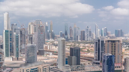 Rows of skyscrapers in financial district of Dubai aerial timelapse.