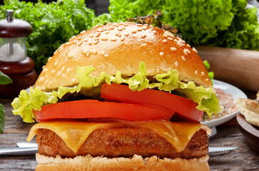 Delicious hamburger with meat bun and vegetables