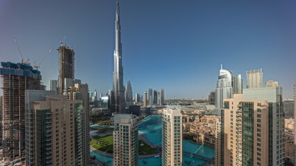 Obraz premium Panorama showing Dubai Downtown cityscape with tallest skyscrapers around aerial timelapse.