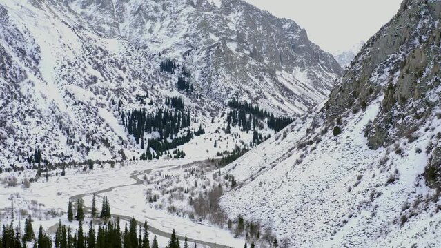 ala archa river kyrgyzstan in winter flight on a drone view from above