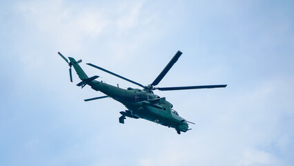 Fototapeta na wymiar Combat helicopter MI-24 in the sky