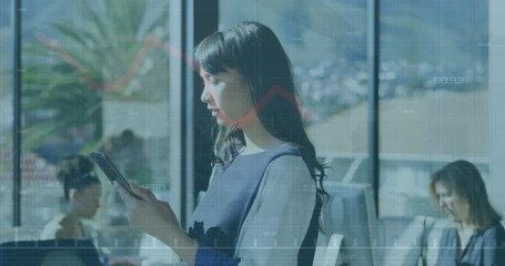 Animation of financial data processing over biracial businesswoman using tablet in office - Powered by Adobe