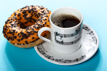 Coffe cup with sweet donut