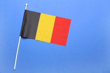 National flag of Belgium on blue background