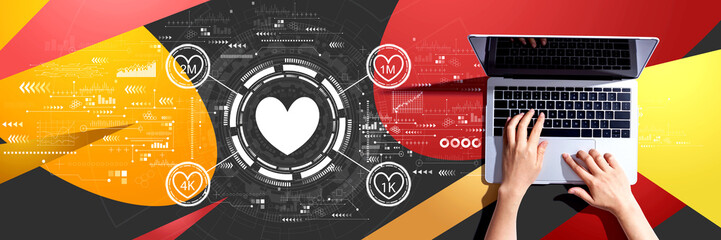 Get more likes concept with person using a laptop computer