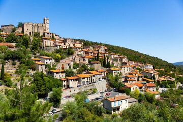 Fototapeta na wymiar Sunny summer landscape of old stone village Eus, France
