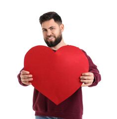 Young bearded man with big paper heart for Valentine's Day on white background