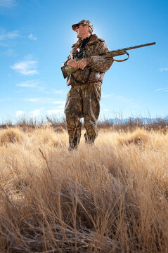 A hunter poses with his shotgun in Nevada.