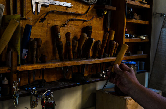 Violin maker luthier Carlos Roberts in his Cremona Italy  worksh