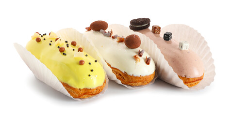 Various glazed eclairs isolated on white background