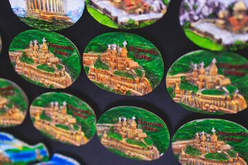 View of traditional tourist souvenirs, presents and gifts from Armenia, fridge magnets with text 
