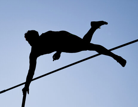 Illustration picture shows a pole vaulter (silhouette) jumping 