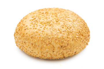 Sesame burger bun isolated on white background. Clipping path.