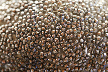 metallic shiny texture.grainy texture. background in bronze tones.Wallpaper metallic in dusty gray colors.