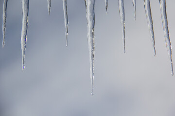 icicles hanging from a roof