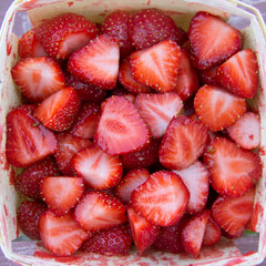 Slices of strawberries in a box