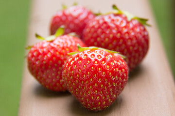 strawberries on a wooden table