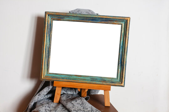 Frame in Provence style on an easel with drapery. Place to insert a picture