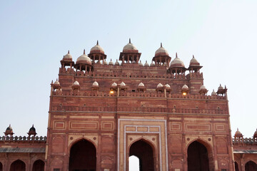 Medieval red sandstone gateway known as the Buland Darwaza at Fatehpur Sikri, Agra, India.