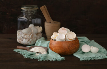 Fototapeta na wymiar Eggshell ground, homemade calcium, Wooden container, eggs, shells, calcium.