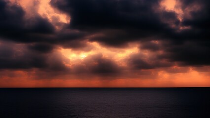 Fototapeta na wymiar Dramatic and moody orange and blue cloudy sunset sky.