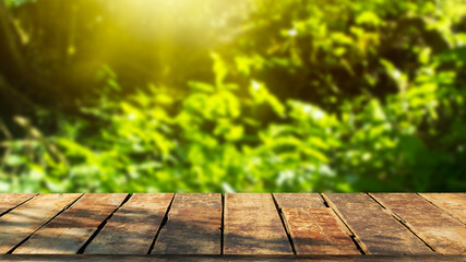 A wooden table on a blurry meadow background