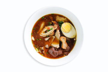 Rolled Noodles in Five Spice Broth (Guay Jub Nam Kon), pork offal, in addition, tofu, boiled eggs,...