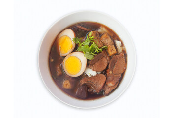 Rolled Noodles in Five Spice Broth (Guay Jub Nam Kon), in addition, tofu, boiled eggs, and pork blood are also added, top view, isolated 