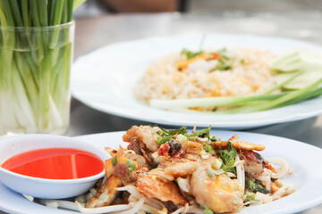 Crispy Pan Fried Mussels With Eggs (Hoi Tod) Thai Street Food, is one of the best Thai street food dishes, selective focus 