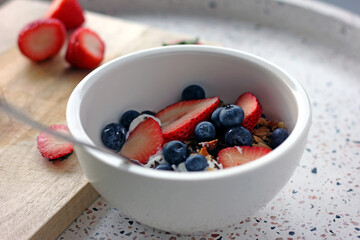Bowl of granola with fresh fruit