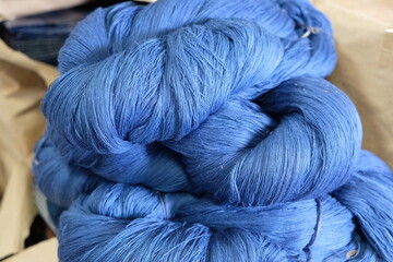 indigo dyed yarn, blue color,natural cotton yarn. Natural fibers thread from natural cotton dyed with natural color , Thailand.