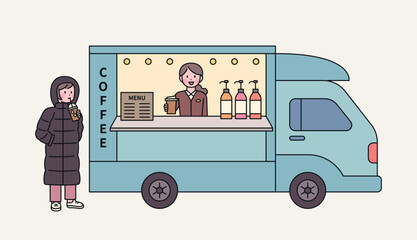korean street food. Koreans who drink iced coffee even in the cold winter. A customer is wearing a down jacket and ordering an iced americano from a coffee truck.
