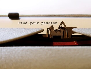 Vintage typewriter with typed text FIND YOUR PASSION, means finding something you’re passionate about and do it for a living