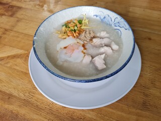 Fish porridge with egg breakfast