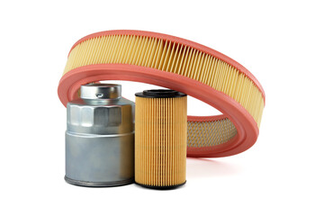 Round air, fuel and oil filters isolated on a white