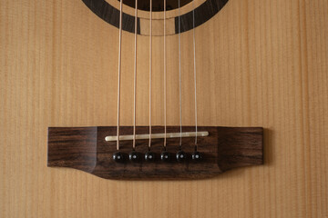 Classic Acoustic GA guitar with Satin Finished close up, dramatically lit on a black background...