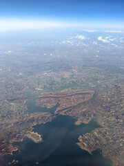 India, Bangalore to Mumbai, a view of a large body of water with a mountain in the background
