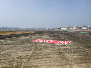 India, Bangalore to Mumbai, a boat sitting on top of a runway