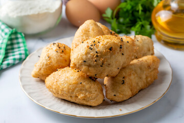 Turkish cuisine; Handmade Cheese spinach Pastry (Turkish name; peynirli - ispanakli pogaca - pisi)