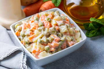 Russian salad Olivier with mayonnaise and egg served (Turkish name; Rus salatasi)