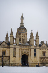 Beautiful Architecture of King's College Porters' Lodge and gate during winter snow at Cambridge ,...
