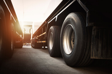 Big Semi Trailer Truck Wheels Tires. Rubber, Wheel Tyres. Trucks on The Parking Lot. Freight Trucks...
