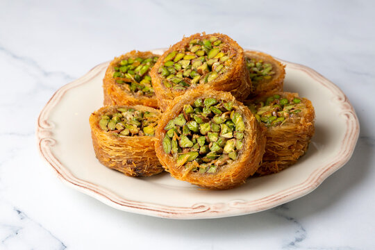 Traditional Turkish desserts; Kadaif stuffed with pistachios. Turkish name; Kadayif dolmasi or dolma kadayif