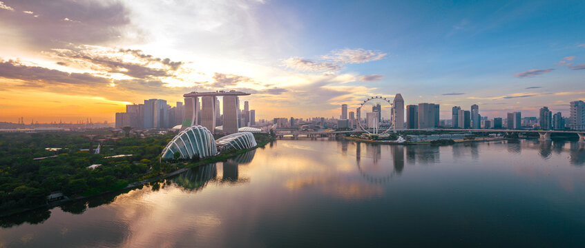 Singapore city skyline at sunset aerial view