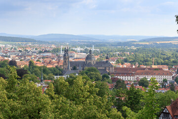 Fototapeta na wymiar Panorama view of city Fulda with church Fulda Cathedral and Rhön mountains in the background, Germany